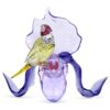 Idyllia: pinzón de Gould y orquídea