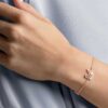 Pulseras de cisne, rosa, chapadas en tono oro rosa