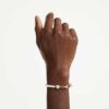 Pulseras Idyllia con perlas de cristal, blancas, chapadas en tono dorado Pulseras Idyllia con perlas de cristal, blancas, chapadas en tono dorado