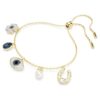 Pulseras Symbolica con perla de cristal, trébol, ojo del mal y herradura, azul, chapada en tono dorado